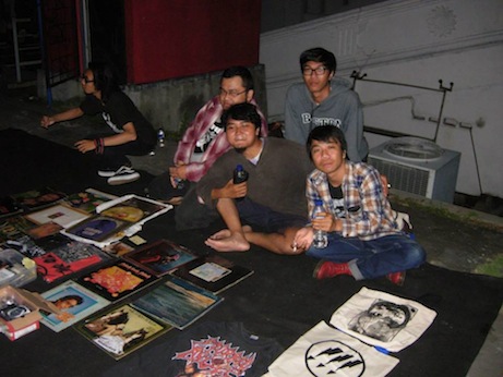 A familiar sight in Jogja: Indra Menus and crew behind the merch desk